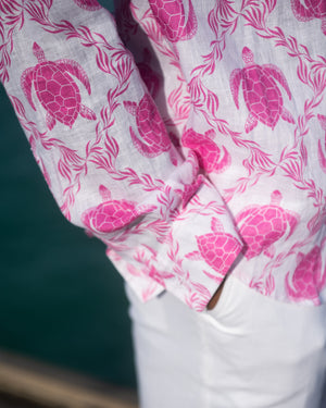 Men's elegant linen holiday shirt in pink Turtle print by designer Lotty B Mustique