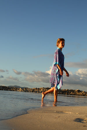 Luxury silk robe in violet & turquoise Protea print designed by Lotty B Mustique