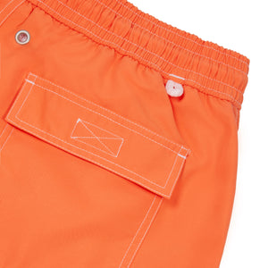 Mens quick dry orange swim shorts back pocket detail by designer Lotty B Mustique for Pink House vacation essentials