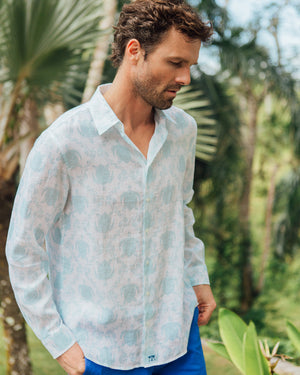 Men's linen vacation shirt in aqua blue Turtle print by designer Lotty B Mustique