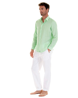 Mens green casual shirt worn with white linen trousers by designer Lotty B for Pink House Mustique 