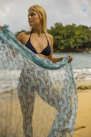 Stylish designer beach vacation style, chiffon silk sarong / scarf in Lurcher blue print by Lotty B Mustique