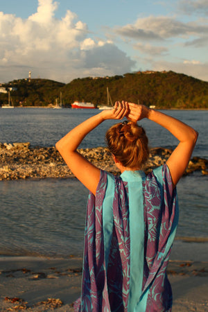 Resort wear robe top in violet & turquoise Protea print designed by Lotty B Mustique