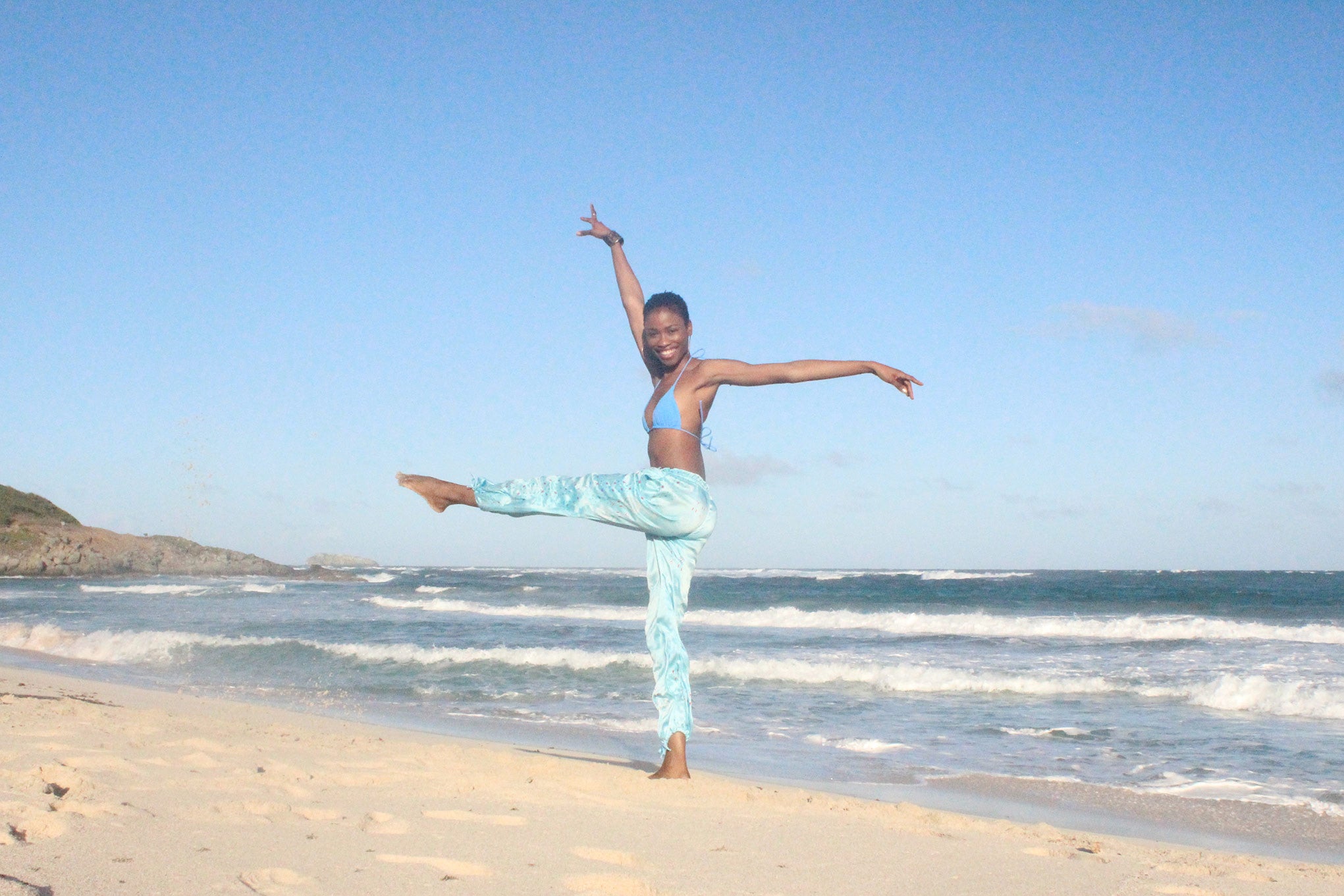 Jennlee dances in Lotty B silk trousers on Pasture Bay