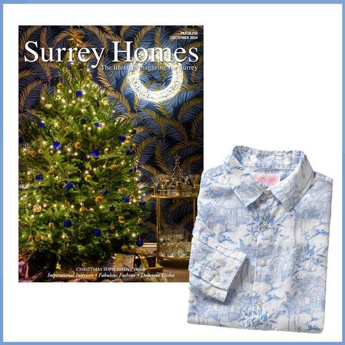 Surrey Homes magazine cover with decorated Christmas tree and folded patterned shirt