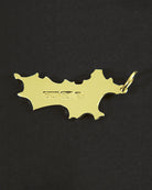 Back of 18k gold Mustique island pendant showing 750 hallmark luxury island necklace made in England