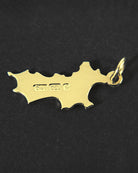 Hallmarked 18k gold Mustique island pendant back detail with 750 stamp luxury island jewellery made in England