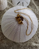 Solid 18k gold Mustique Island pendant and chain, luxury British jewellery made in England