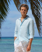 Caribbean vacation style in a mens finest linen in pale blue shirt by Pink House Mustique