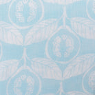 Linen fabric swatch Guava pale blue designer Lotty B Mustique