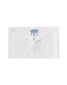 Pure linen envelope gift bag with crossed palms embroidery in azure blue embroidery on White linen