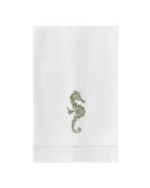 White linen guest towel with green seahorse embroidery – luxury coastal embroidered hand towel in pure linen