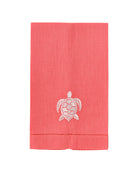 Coral pink linen hand towel with white embroidered turtle – luxury tropical coastal bathroom or guest towel
