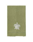 Sage green linen hand towel with white turtle embroidery – eco-luxe coastal bathroom or beach house accessory