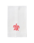 White linen hand towel with coral pink embroidered turtle – tropical beach home or summer guest bathroom towel