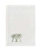 Luxury white linen placemat with green embroidered palms – pure linen tropical decor by Pink House Mustique