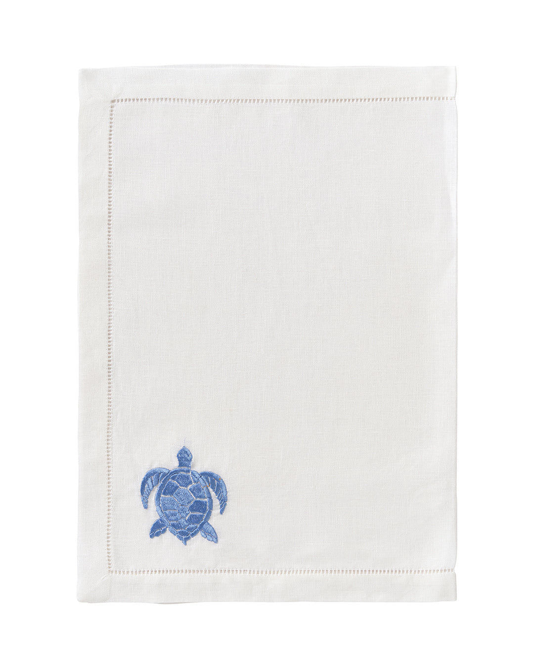 White linen placemat with azure blue embroidered turtle – nautical turtle motif table linen by Pink House Mustique