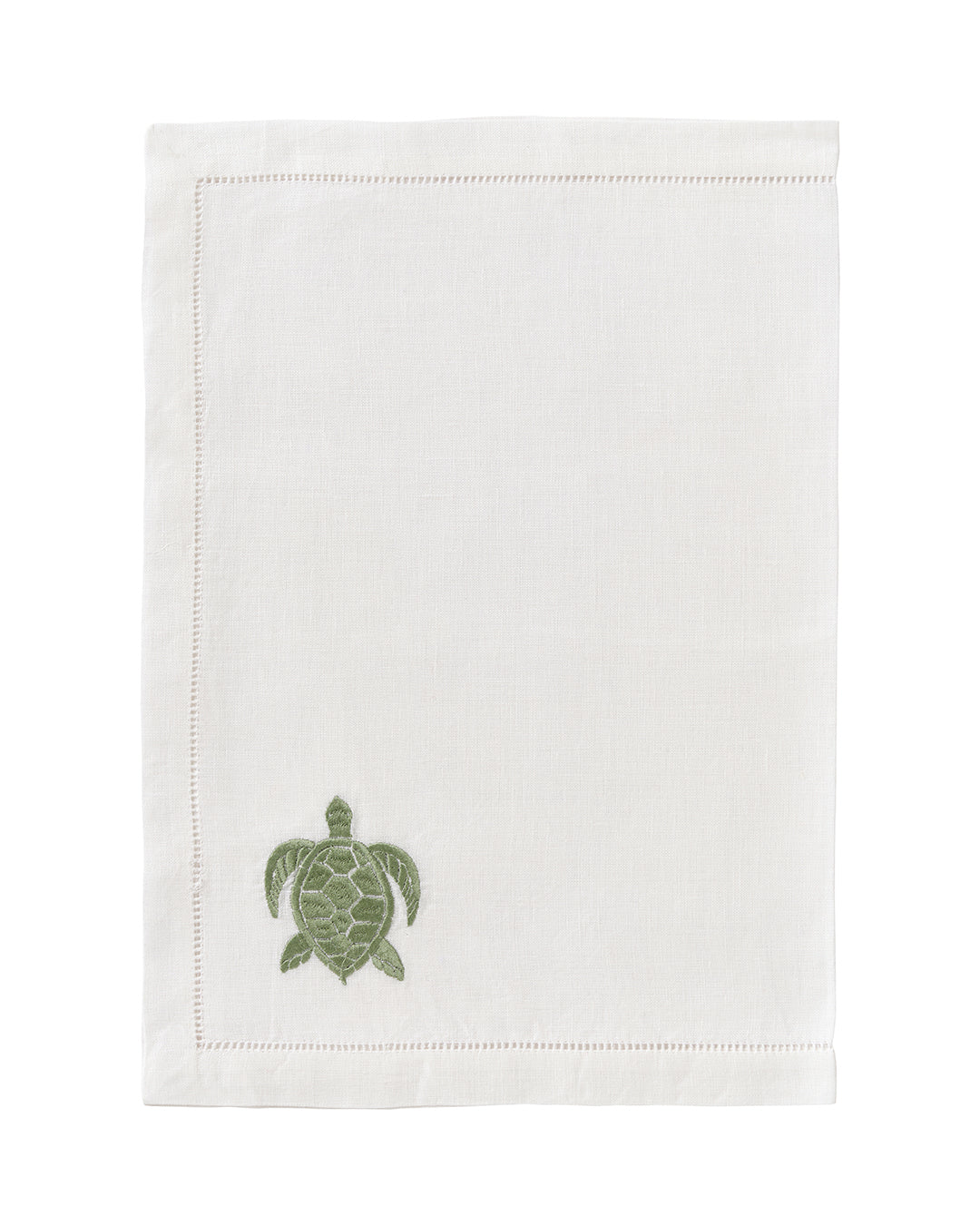 White linen placemat with sage green embroidered turtle – elegant island-inspired table linen by Pink House Mustique