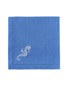 Pure linen napkin in blue with white embroidered seahorse motif – coastal luxury table linen for beach house or summer dining