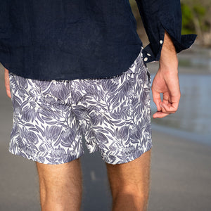 Quick dry mens swim shorts in violet blue floral Protea print