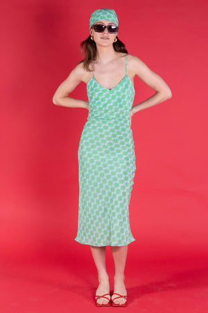 The Kate, pure silk evening dress in lime slice green crepe de Chine designer Lotty B Mustique for Pink House Atelier Collections