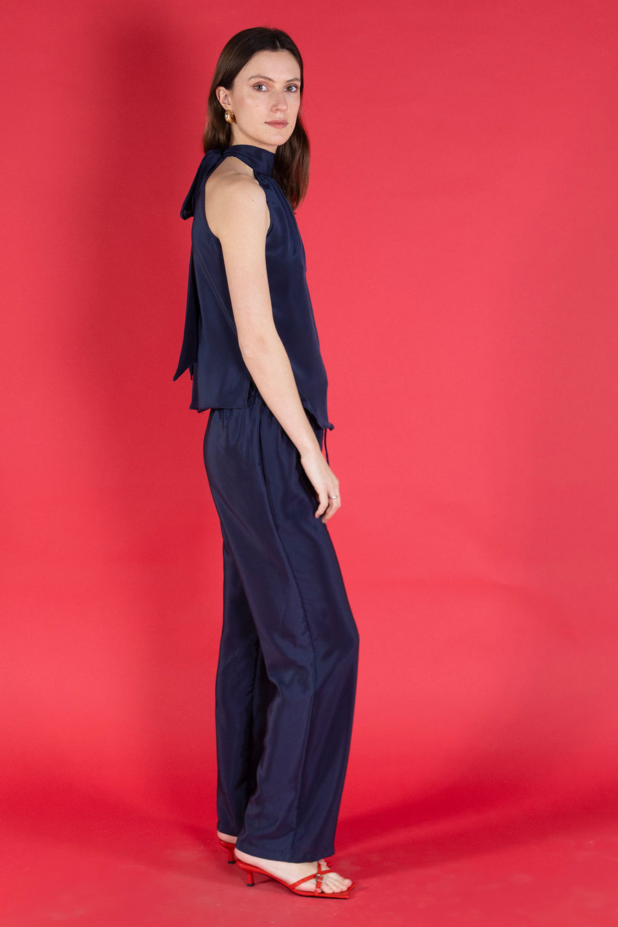 Marina trousers in navy silk crepe de Chine worn with halterneck Olivia top from Pink House Atelier Collections - handmade made to order 