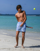 Designer Iguana Blue mid-length swim trunks by Pink House Mustique, regular European cut and Velcro® back pocket.