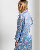 Back view of Parrot Blue silk pajama shirt – luxury women's nightwear with tropical bird print by Lotty B