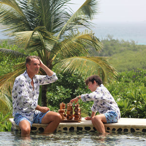 Boys swim shorts: MONKEY and PALMS - PLUM