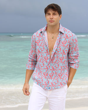 Beach vacation men's linen shirt in coral and turquoise Parrot print designer Lotty B Mustique