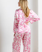 Women’s luxury silk pyjamas in Parrot Pink tropical bird print – long sleeve shirt and wide-leg pants