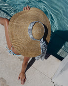 Designer long silk scarf bicycle black pale blue styled on a beautiful huge sun hat at Lavender Hill Villa, Mustique Island
