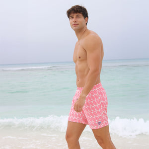Men's beach holiday swim shorts in coral pink Striped Shell print by designer Lotty B