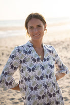 Resort style women's linen dress with frilled cuffs in green and navy Monkey print, the Decima dress by Pink House