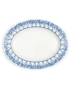 Fine bone porcelain oval platter in Palms Azure Blue crossed palm design – elegant Mustique tableware collection