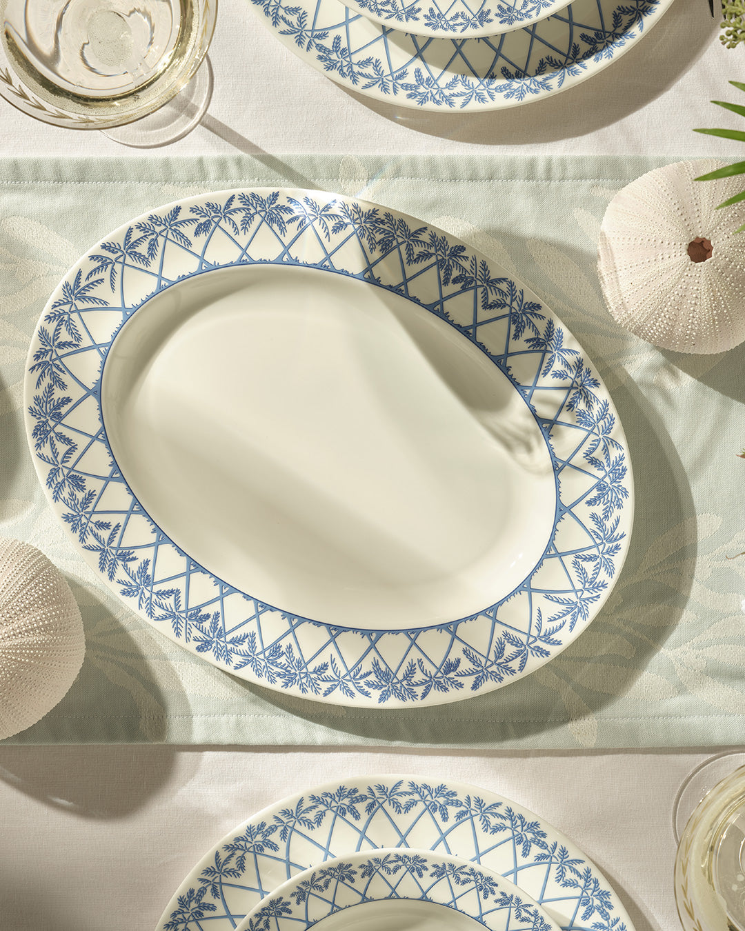 Fine bone china oval serving platter in Palms Azure Blue by Lotty B Mustique – luxury coastal tableware made in England