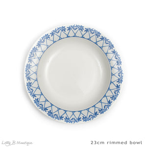 Set includes 12 x 23cm rimmed bowls in Palms blue
