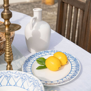 Outdoor table setting with fine bone china platter in Palms blue design
