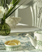 Fine bone china small dish in Palms Sage Green, perfect for serving lemon slices or condiments, by Pink House Mustique.