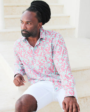 Island style men's linen shirt in coral and turquoise Parrot print designer Lotty B Mustique