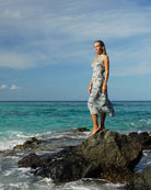 Whale Monochrome Jemima silk halterneck dress worn by the sea in Mustique