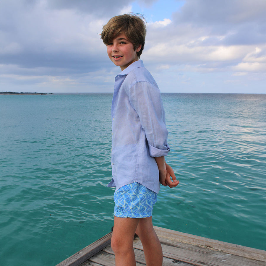 Children's plain azul blue linen shirt by designer Lotty B for The Pink House Mustique