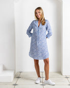 Women’s linen Decima dress in Coral Stone Blue print by Pink House Mustique, relaxed island style.