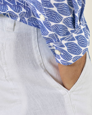Cuff detail of men's linen shirt in blue Striped Shell print designer Lotty B Mustique