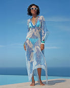 Luxury beach holiday style pure chiffon silk 3/4 length kaftan in Turtle blue design styled by the pool at a villa on Mustique