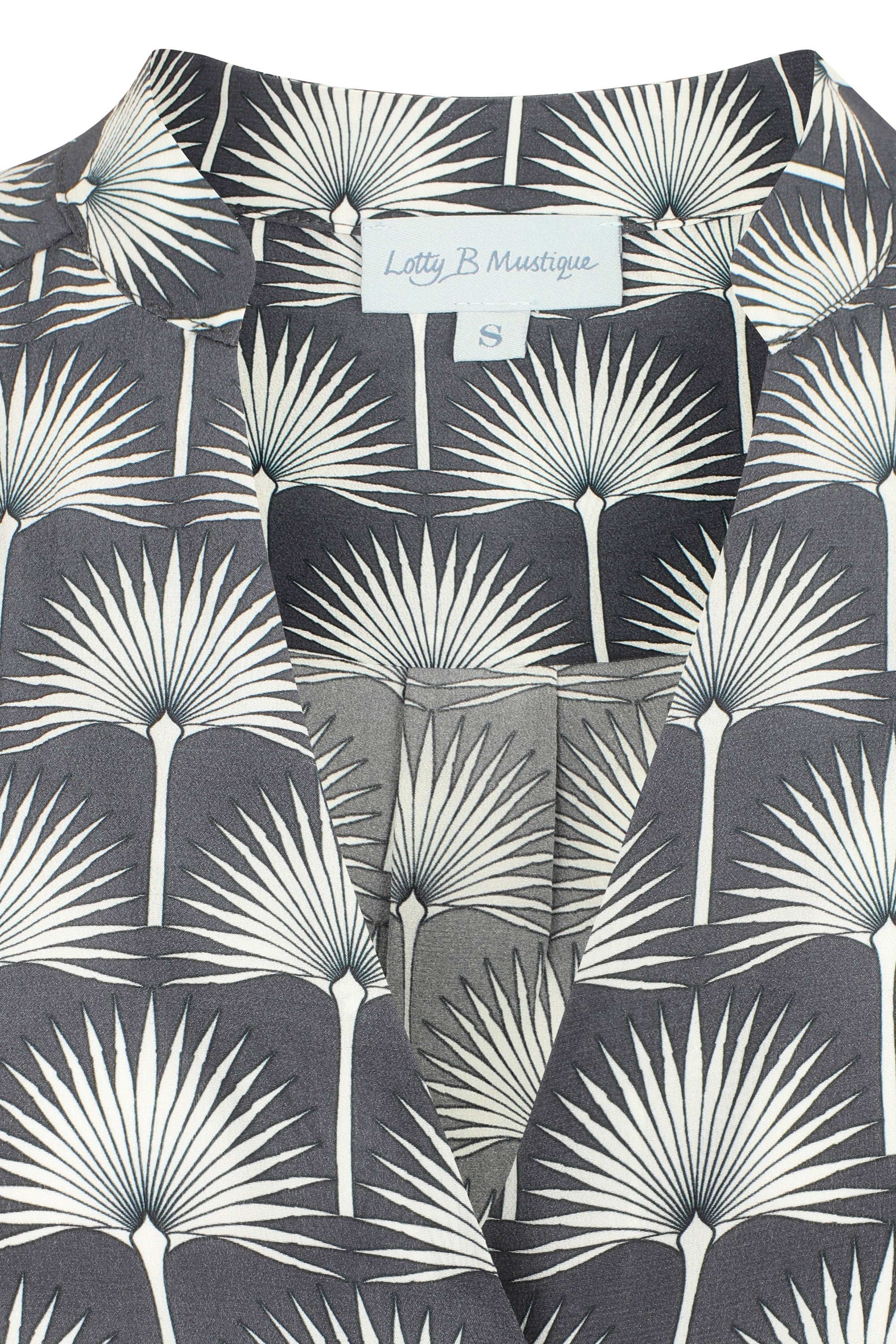 Finest pure silk dress screen printed with black and white single Palm repeat print by designer Lotty B Mustique