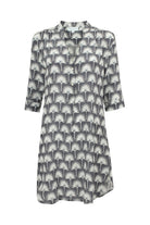 Silk Crepe Decima dress by Lotty B in black and white single Palm print. Mustique Designer Resort Wear