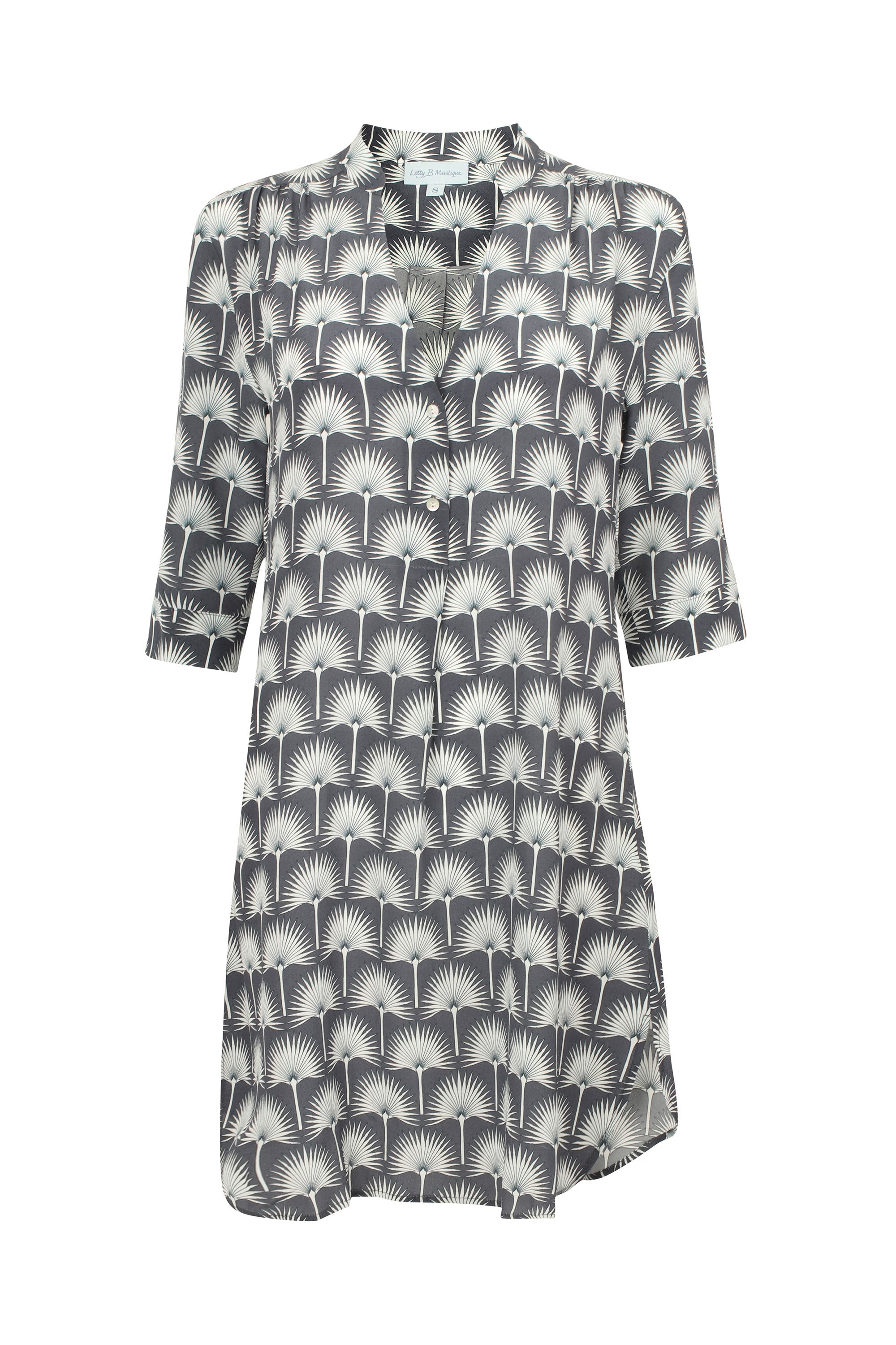 Silk Crepe Decima dress by Lotty B in black and white single Palm print. Mustique Designer Resort Wear