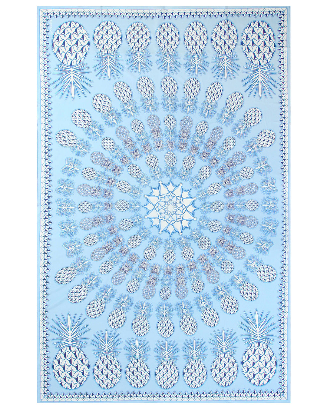 Flat lay of Lotty B silk crepe de chine sarong in Pineapple Blue print, luxury island resortwear handmade in Mustique.