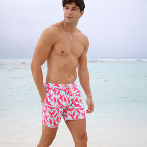 Island vacation men's swim shorts in turquoise blue and coral red Parrot print by designer Lotty B